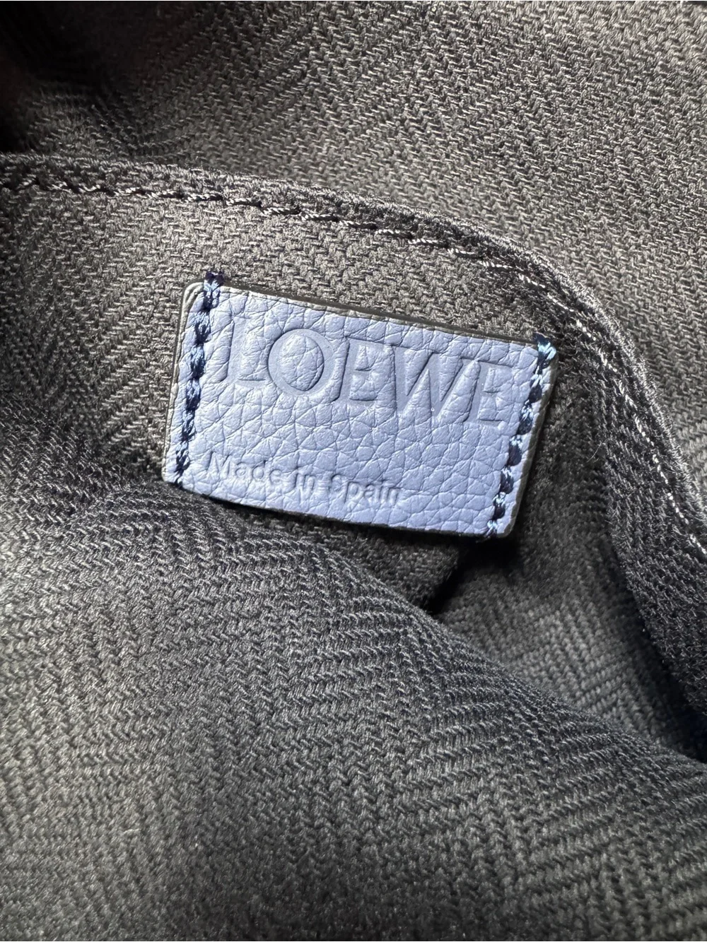 Loewe Navy Pebbled Leather Drawstring Backpack with Black Straps